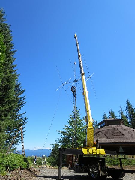 IMG_0670.JPG - Tightening up the rotator clamps to the mast.